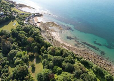 A drone image of Ventnor Botanic Garden and the coast beyond