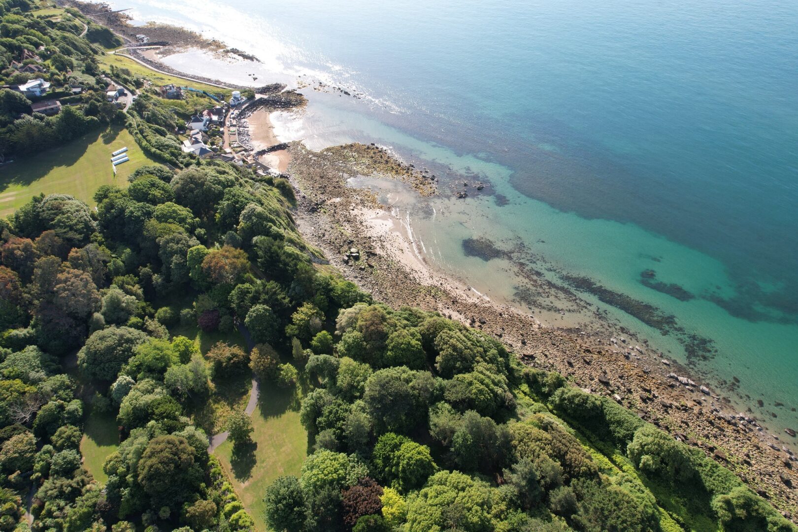 A drone image of Ventnor Botanic Garden and the coast beyond