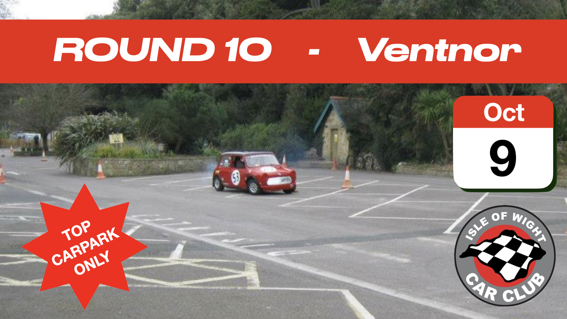 A red racing mini, races through the car park at Ventnor Botanic Garden in a time trial.